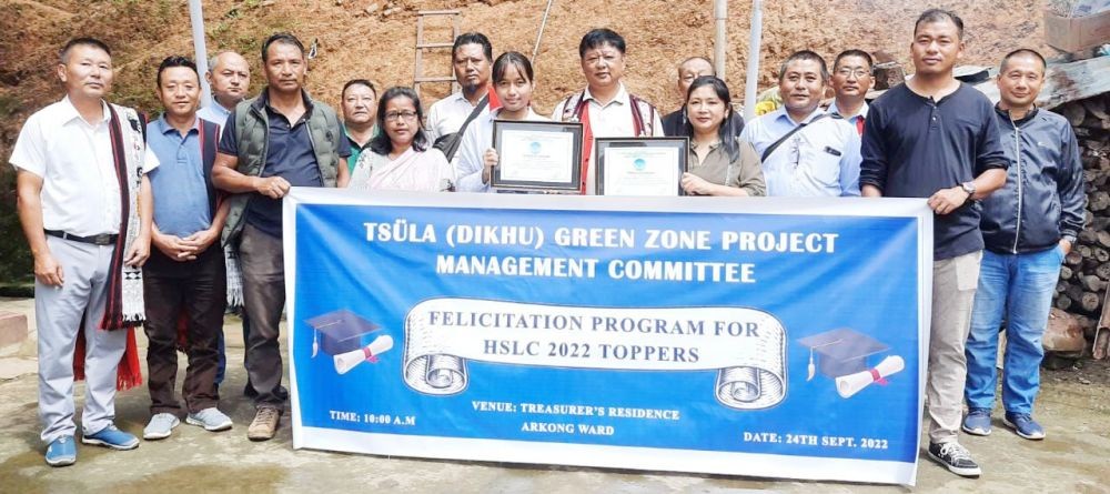 Members of Tzüla (Dikhu) Green Zone Project Management Committee with HSLC & HSSLC toppers after their felicitation programme on September 24. (Morung Photo)